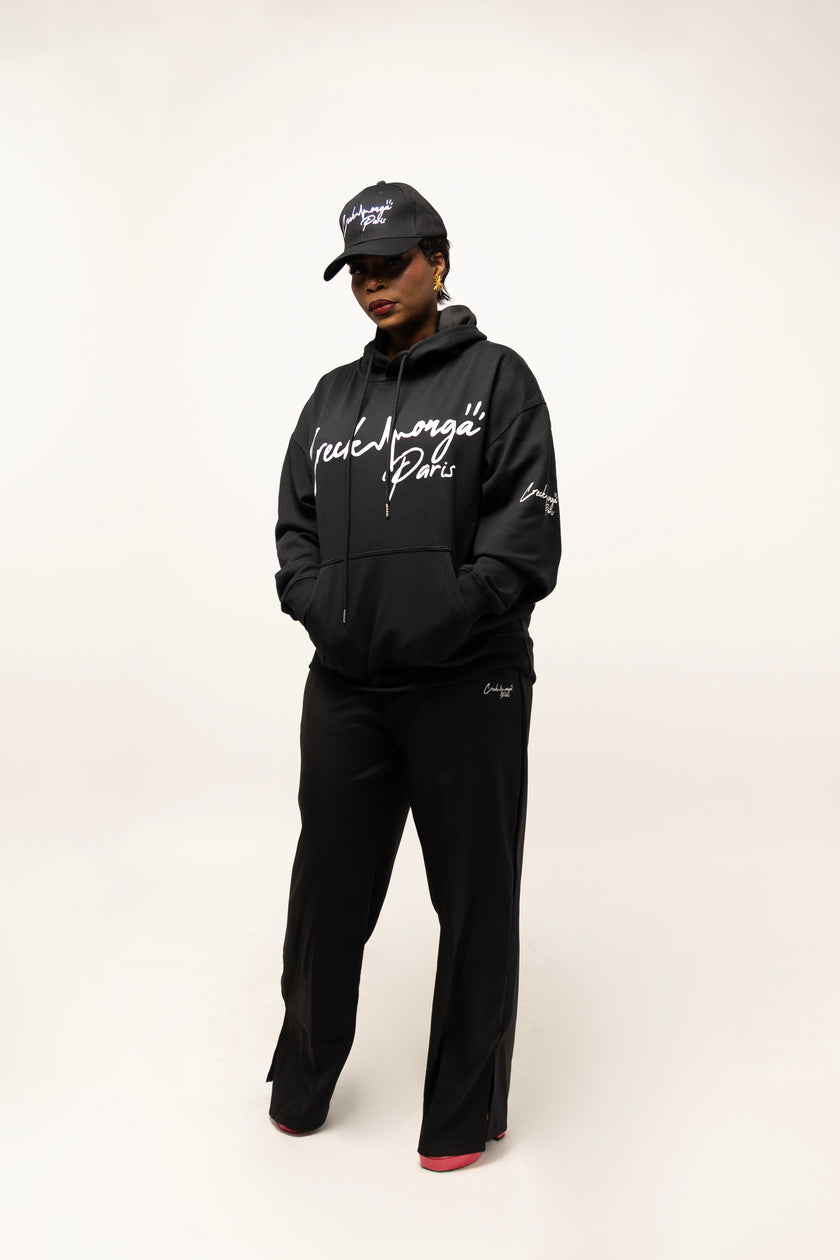 PANTALON HAUTE COUTURE EN POLYESTER IMPRIMÉ LOGO CREKMONGA PARIS, UNE FENTE