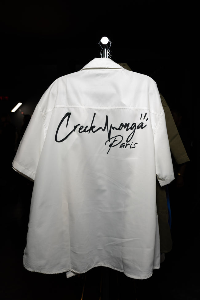 CHEMISE HAUTE COUTURE À MANCHE COURTE , COUPE OVERSIZE, À DEUX FENTES, EN POLYESTER ET COTON IMPRIMÉ – CREKMONGA PARIS