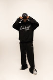 PANTALON HAUTE COUTURE EN POLYESTER IMPRIMÉ LOGO CREKMONGA PARIS, UNE FENTE