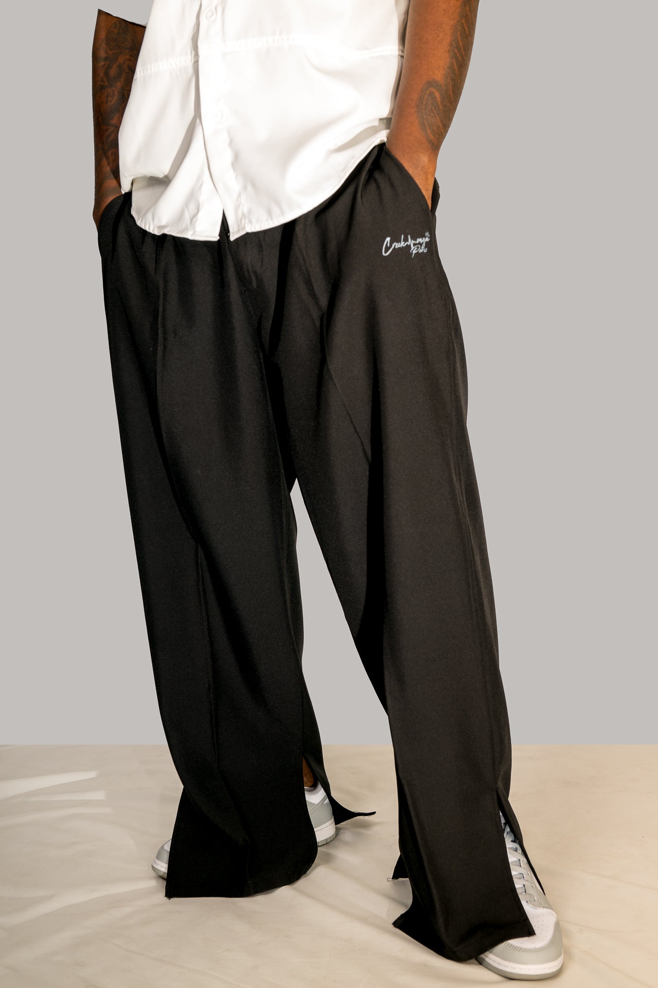 PANTALONI HAUTE COUTURE IN POLIESTERE STAMPATO LOGO CREKMONGA PARIS