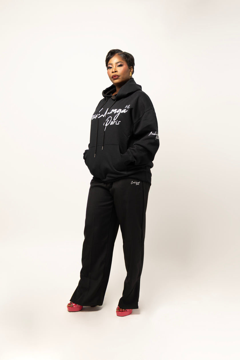 PANTALON HAUTE COUTURE EN POLYESTER IMPRIMÉ LOGO CREKMONGA PARIS, UNE FENTE