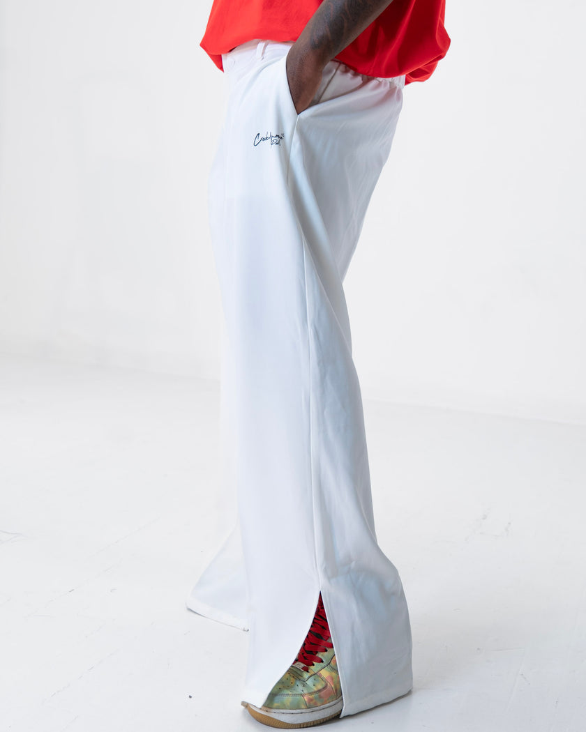 PANTALON HAUTE COUTURE EN POLYESTER IMPRIMÉ LOGO CREKMONGA PARIS, DEUX FENTES